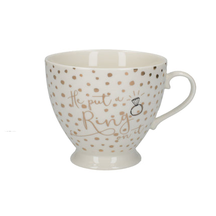 CREATIVE TOPS AVA & I HE PUT A RING ON IT FOOTED MUG